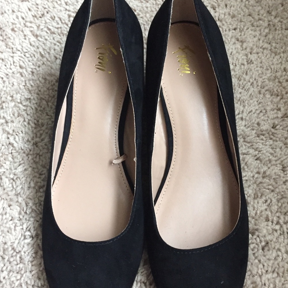 Suede type black small heel.